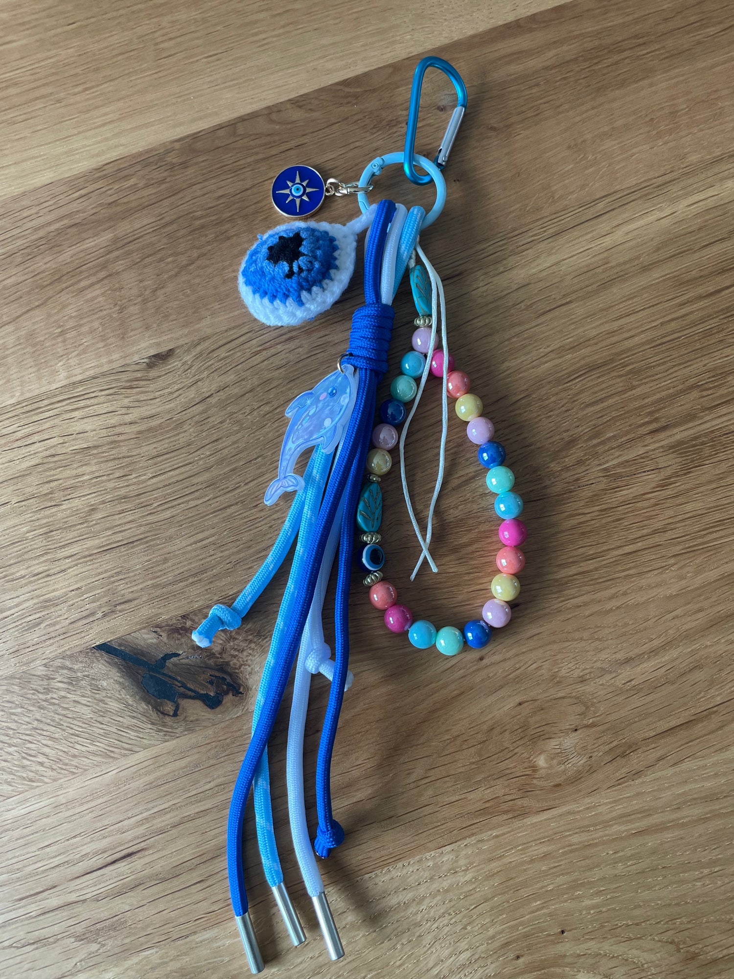 Bijou de sac oeil bleu